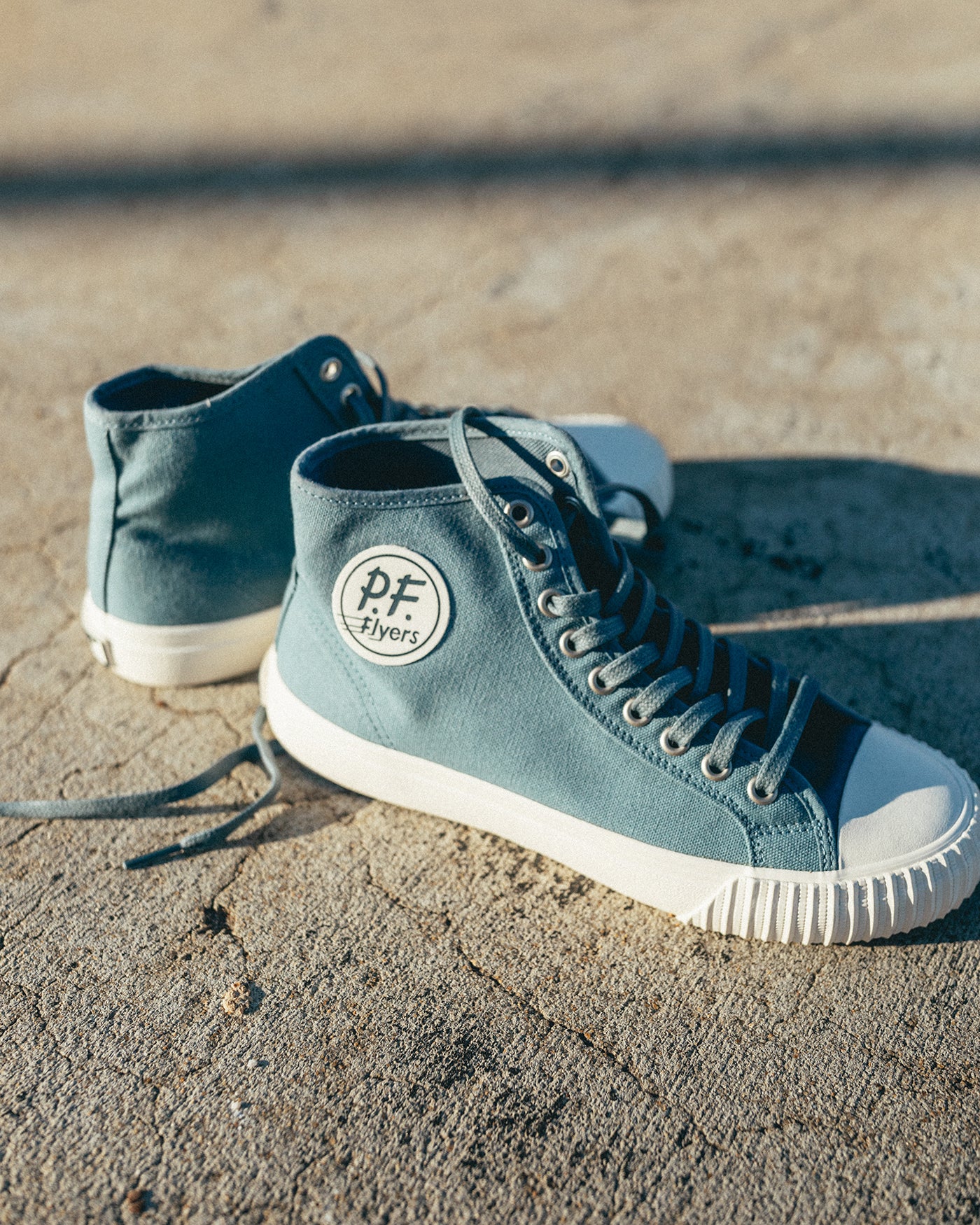 Pf flyers hotsell or converse