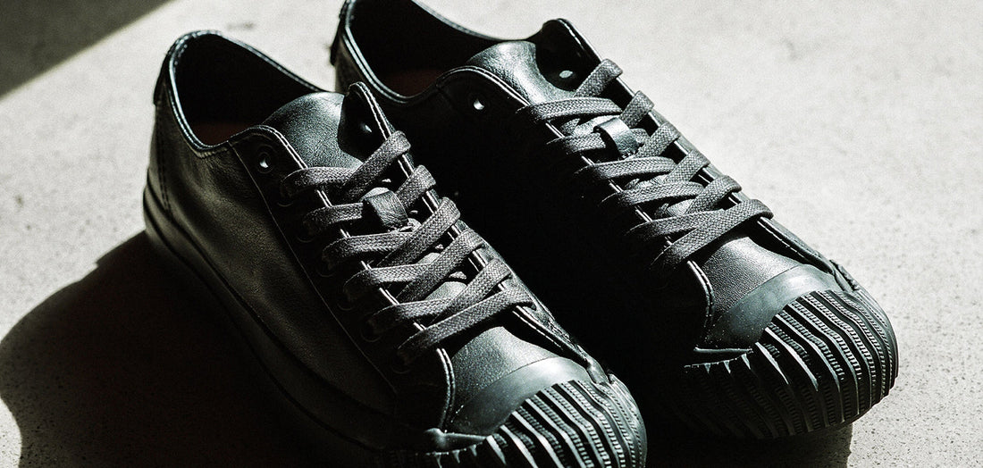 P.F. Flyers black leather low-top sneakers