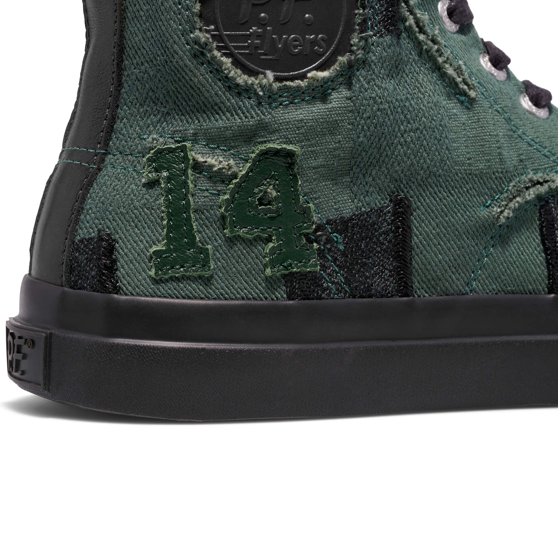 Green high-top sneaker with '14' logo on a white background