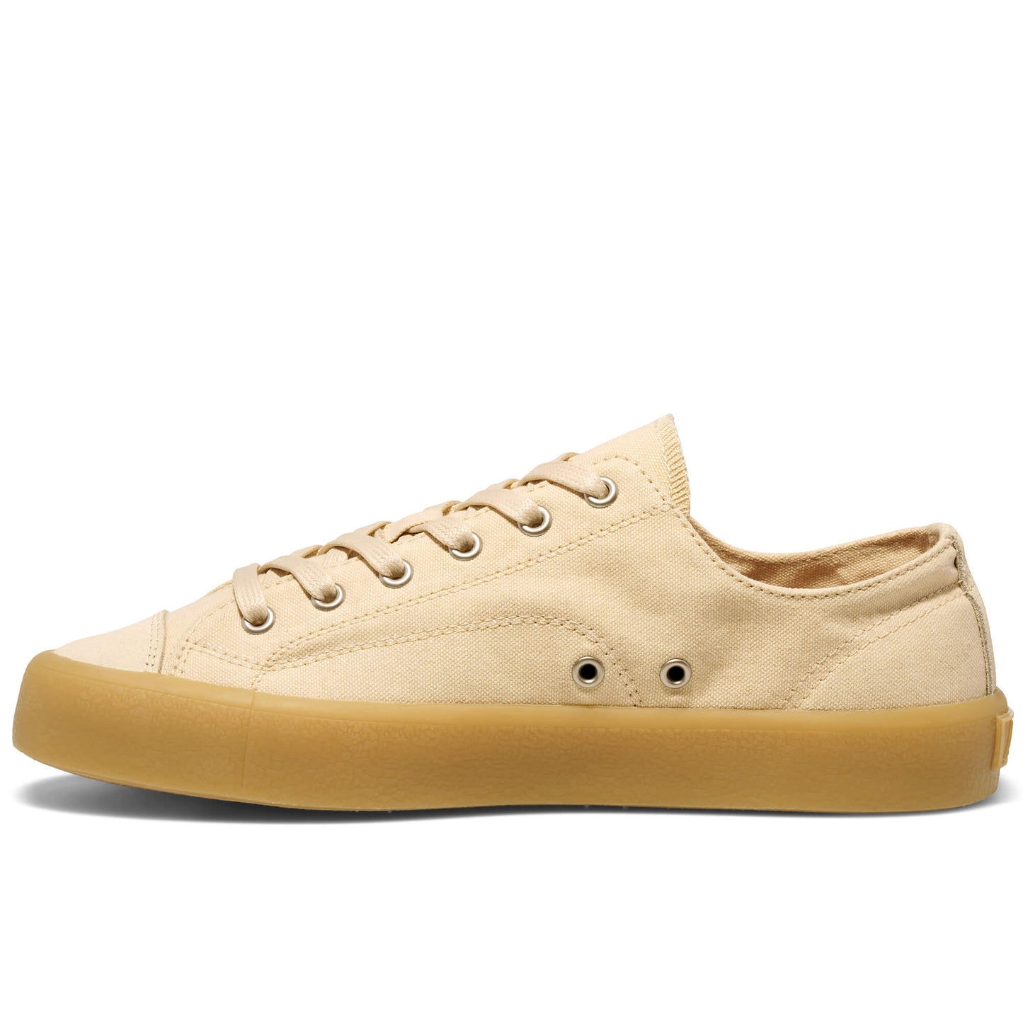 Beige low-top sneaker with a tan sole on a white background.