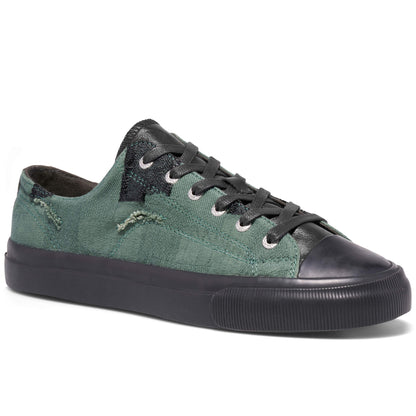 Green and black sneaker on a white background