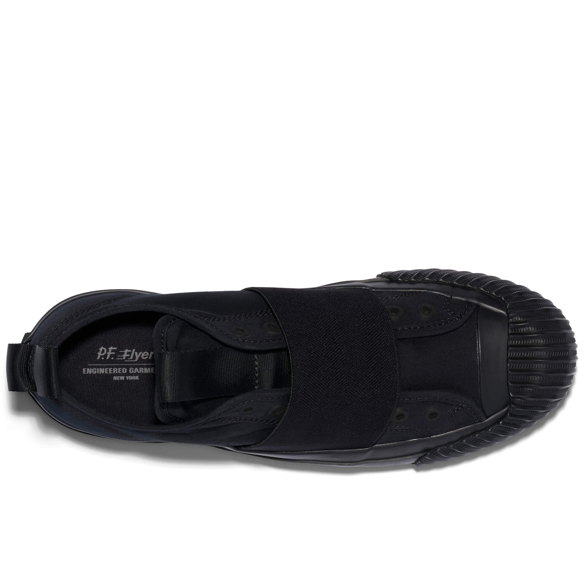 Black sandal with 'P.F. Flyers' branding on a white background