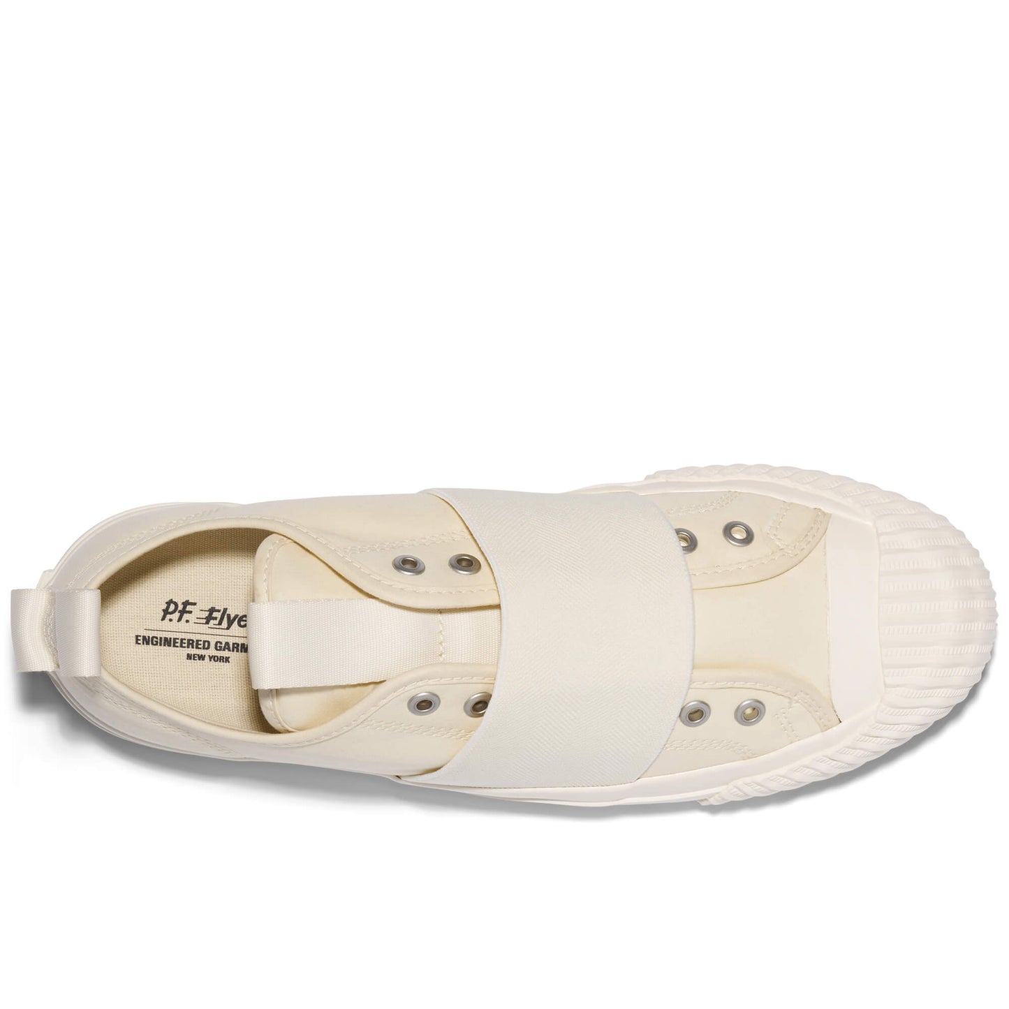 Beige slip-on sneaker with brand label on a white background
