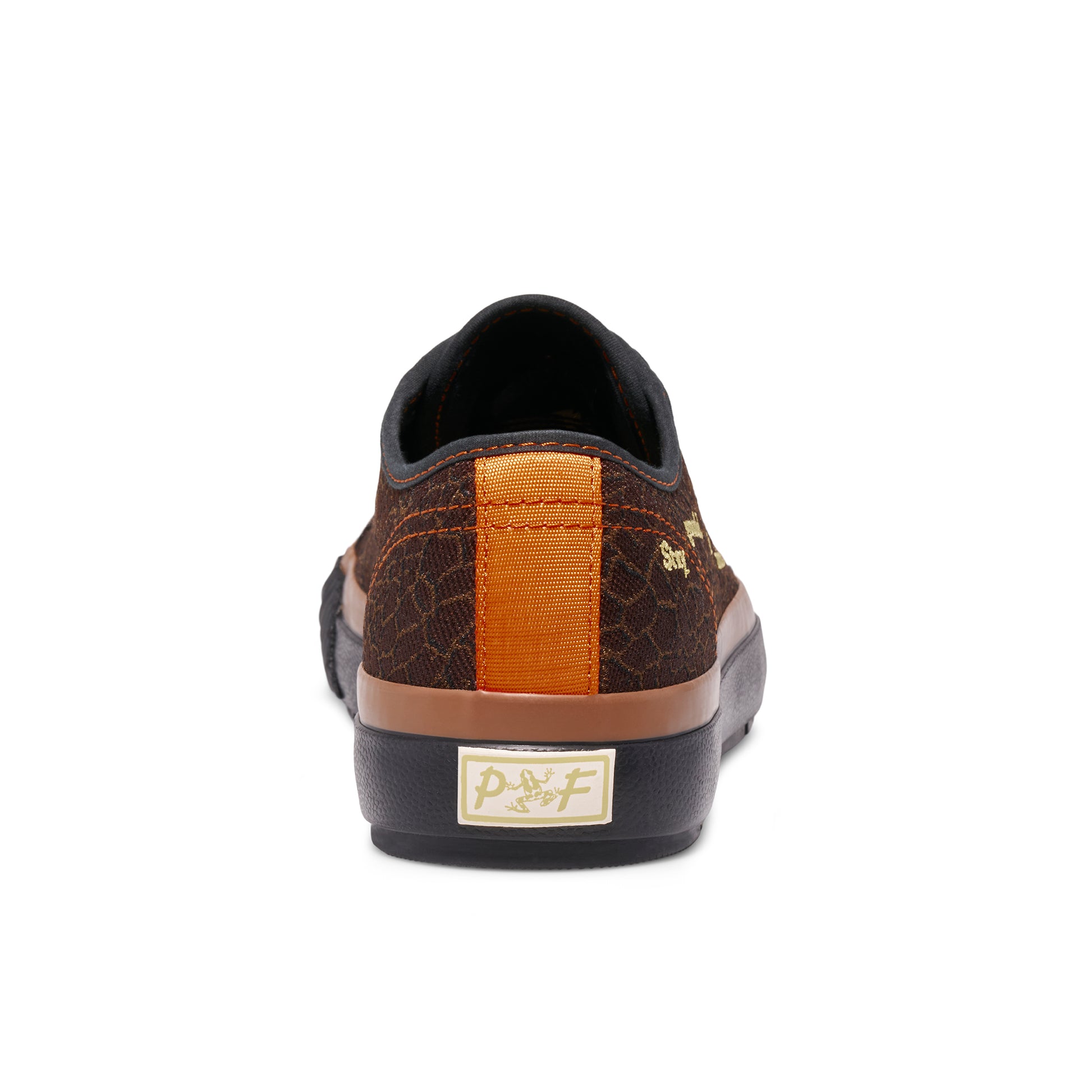 Brown low-top sneaker with an orange heel accent on a white background.